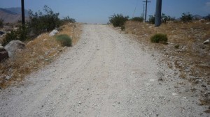 I invented a new game. It is called offroading with a fully-loaded tour bike! All the kids will be playing it.
